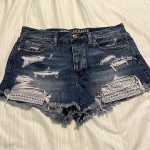 Dark wash distressed jean shorts